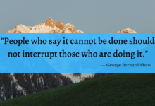 "People who say it cannot be done should not interrupt those who are doing it." Quote from George Bernard Shaw over a photo of mountains.
